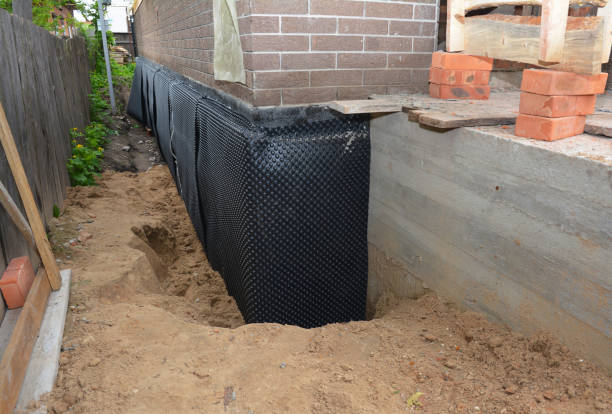 Happy homeowners after waterproofing job in Tarlton